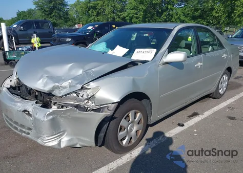 2002 Toyota Camry Le from USA, damaged, VIN 4T1BE32K22U530911